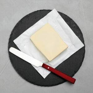 butter on plate with butter knife