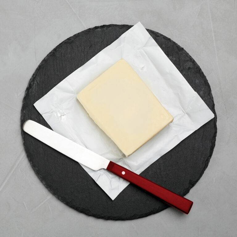 butter on plate with butter knife