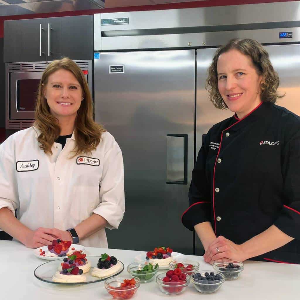 team members in the edlong kitchen collaborating on dairy flavor solutions
