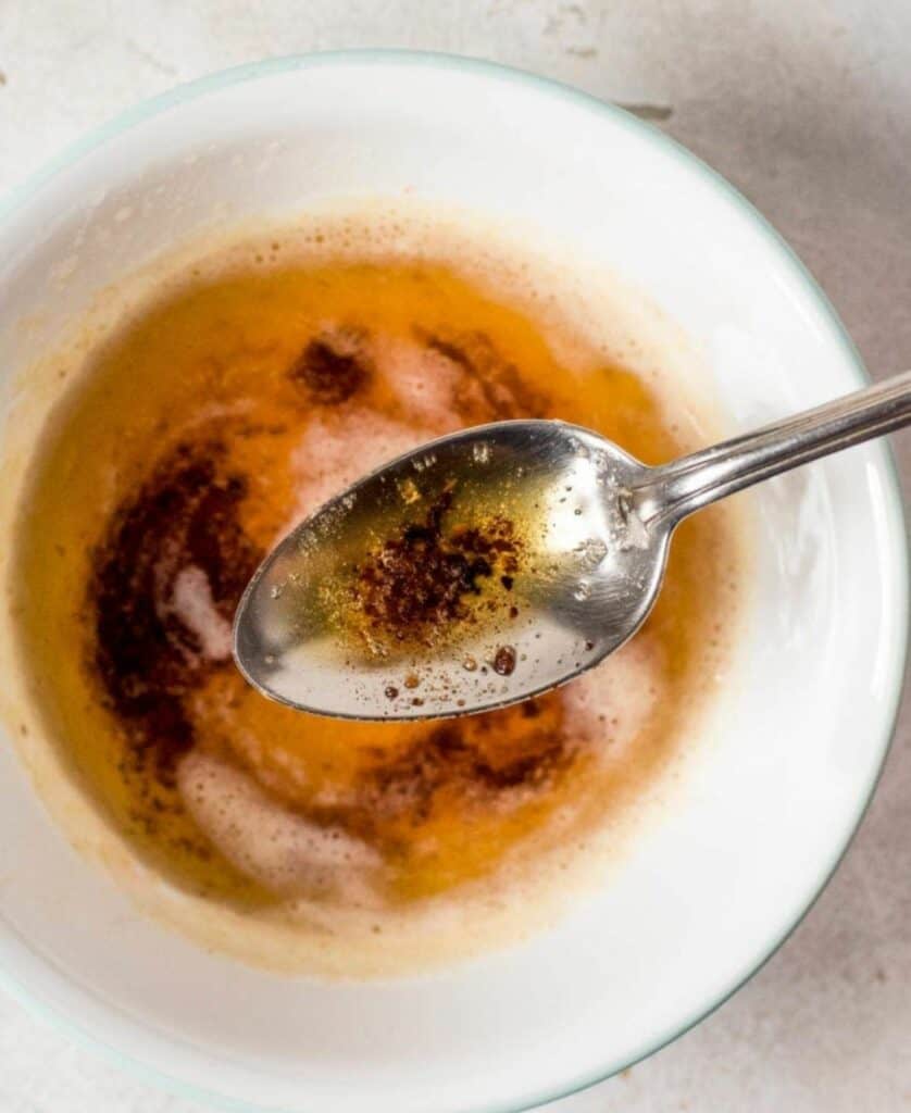 brown butter in a spoon